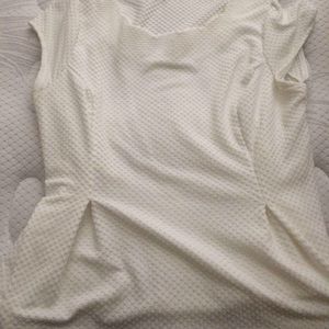 White peplum top